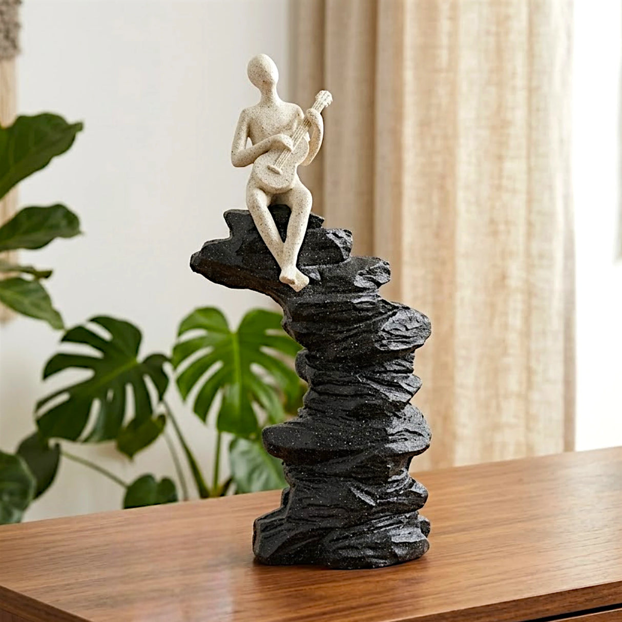 decorative guitar playing figure on rock base statue resin beige and black color china