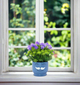 purple flower & ceramic pot 3"hx 7.5"w china d546