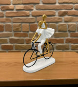 statue couple with cycle white & golden china