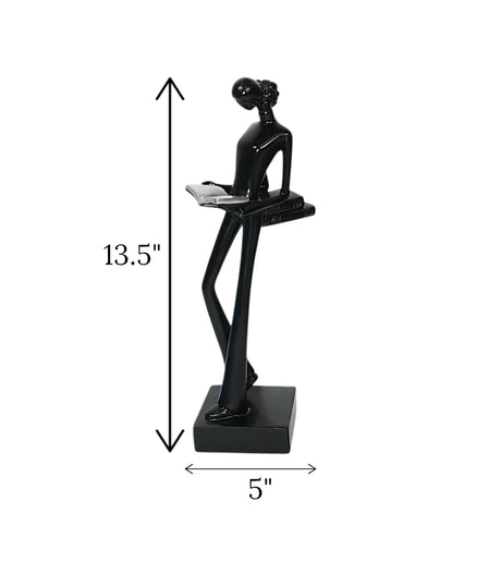 statue holding book black china