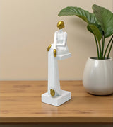 statue girl sitting on bench white china