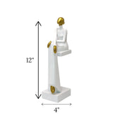 statue girl sitting on bench white china