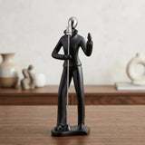 statue singing man black 11"x3.5" china