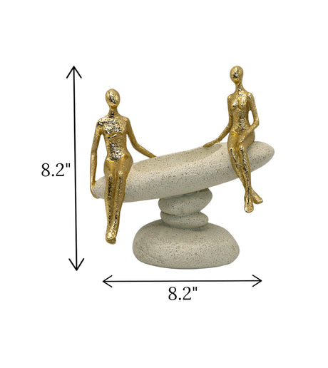 statue couple sitting on rock golden china 8.2x8.2