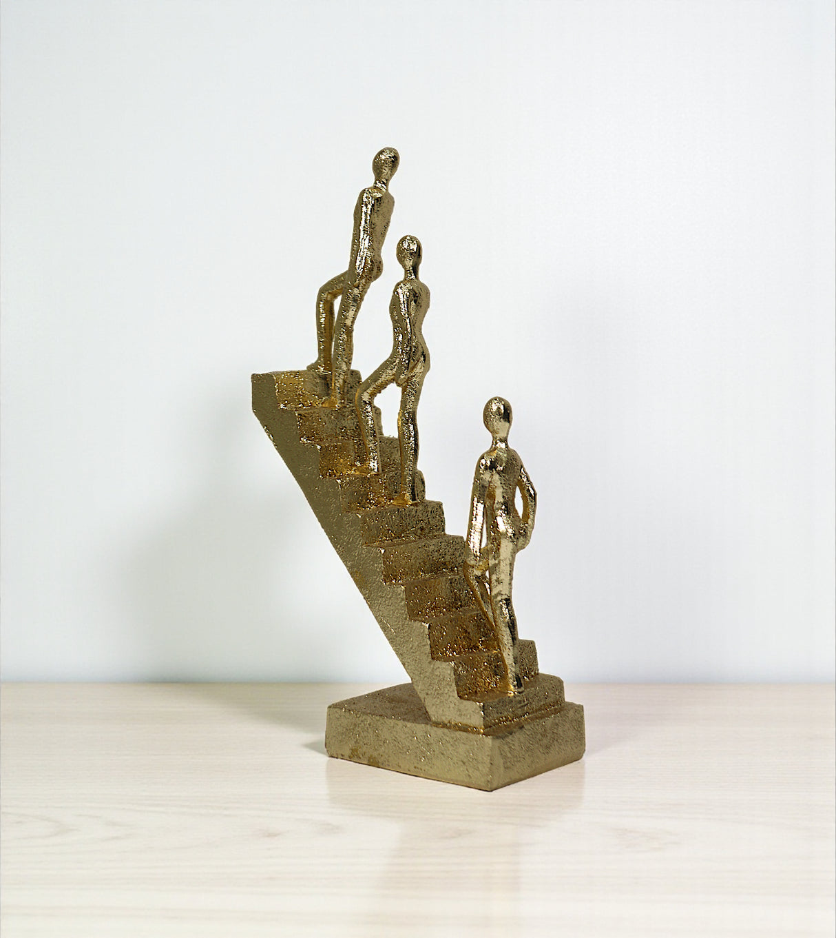 statue 3 men climbing stairs golden china 11.5x6.2