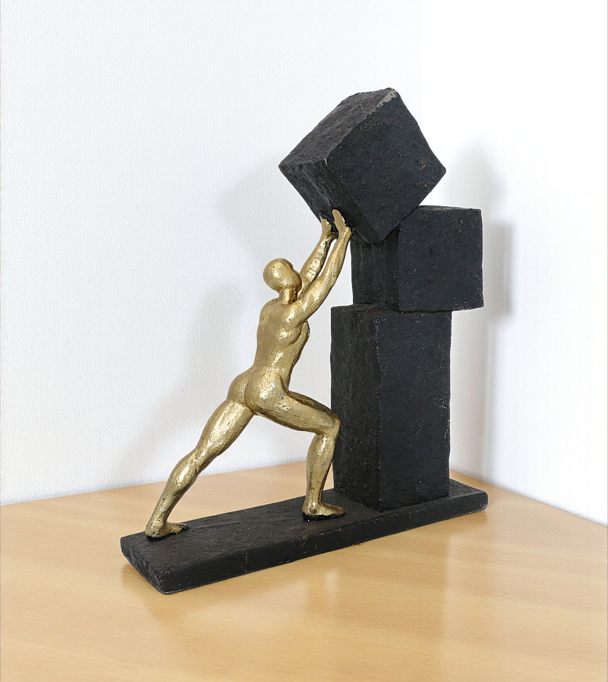 statue pushing stones black china 10.6x9