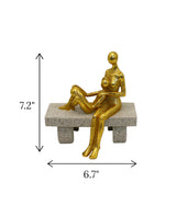 statue couple sitting on bench golden china 7.2x6.7