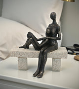 statue couple sitting on bench black china 7.2x6.7