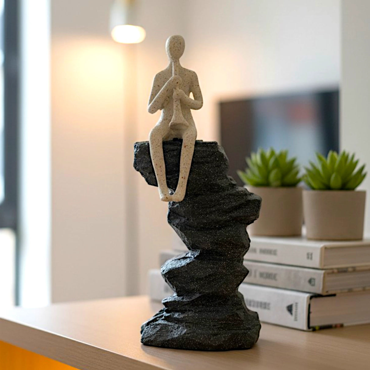 decorative meditating figure on rock statue resin beige and black color 3"x9.5" china