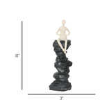 decorative sitting figure on rock base statue resin beige and black color 3"x11" china