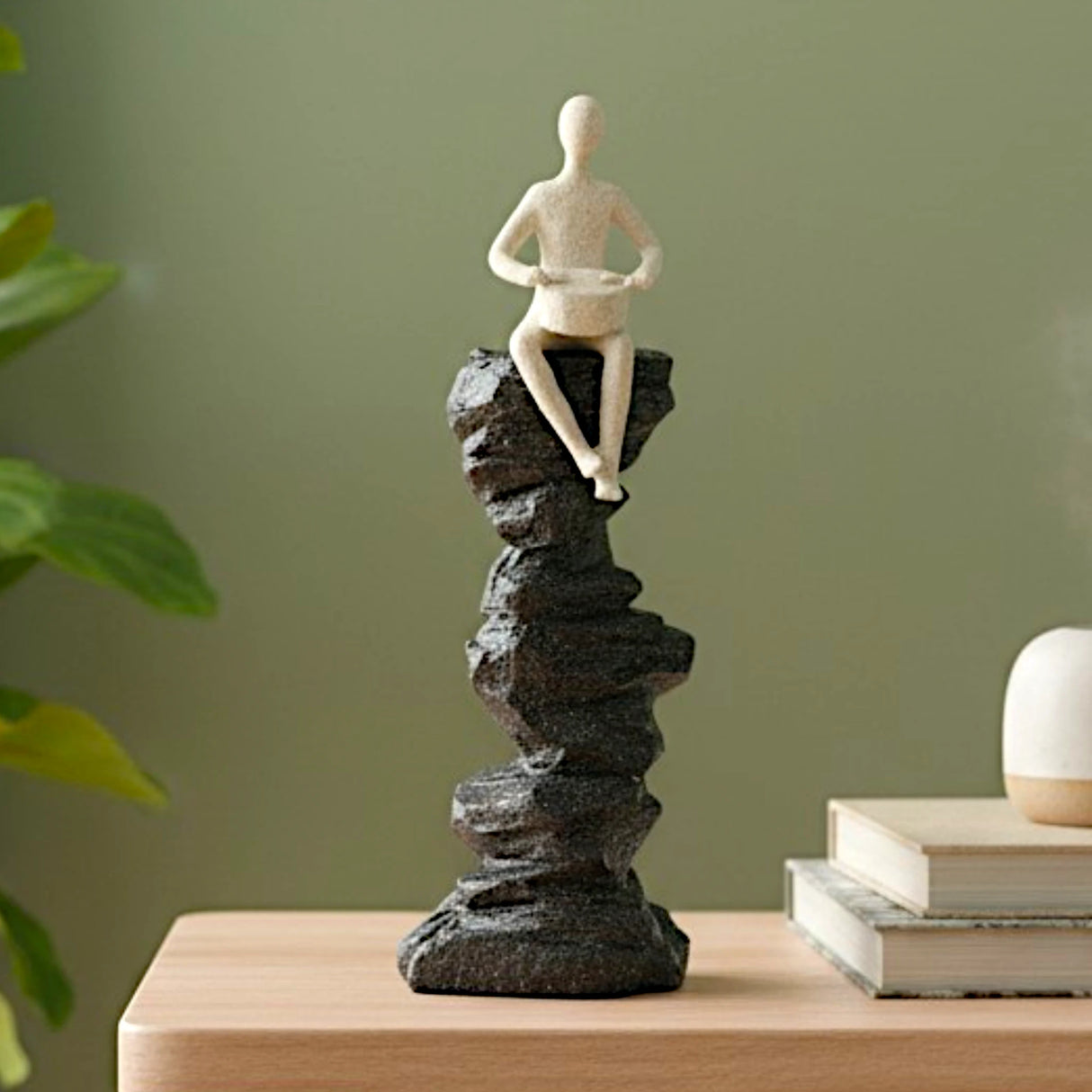 decorative sitting figure on rock base statue resin beige and black color 3"x11" china