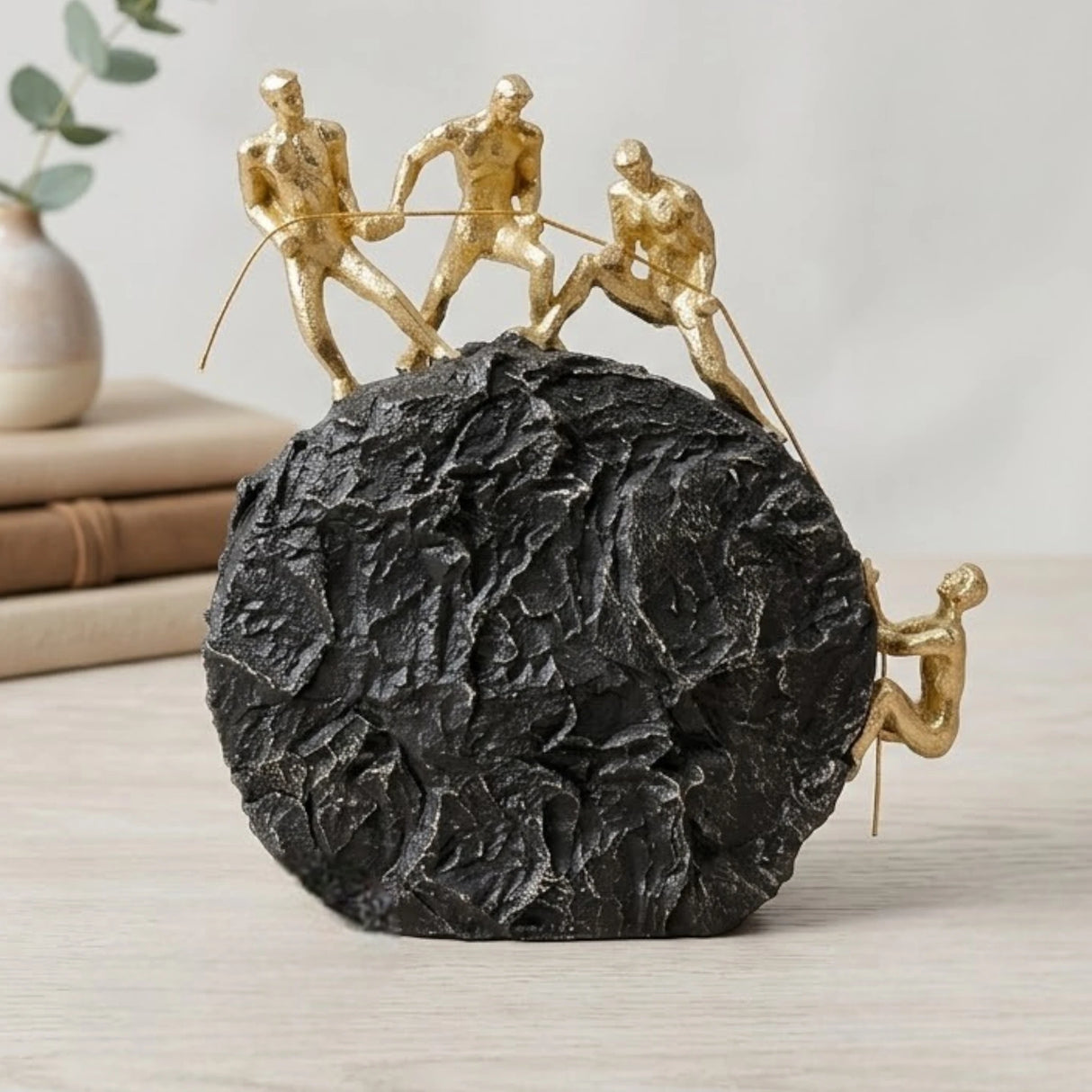 statue 4 figures pulling rope black & golden 10''x5'' china