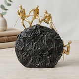 statue 4 figures pulling rope black & golden 10''x5'' china