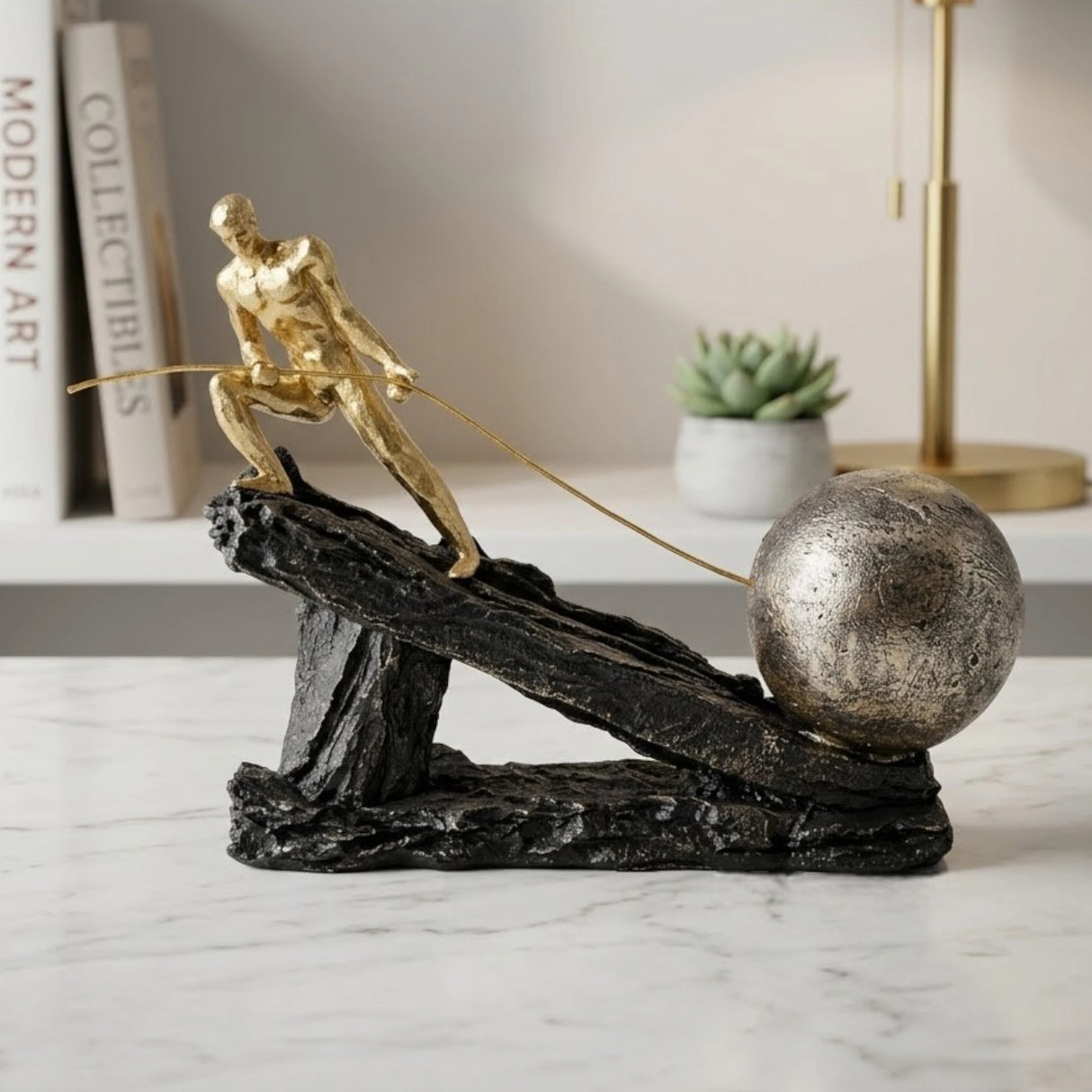 statue men pulling ball black & golden  7.5''x8.5'' china