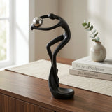 statue dancing figure holding metal ball black 10"x3" china