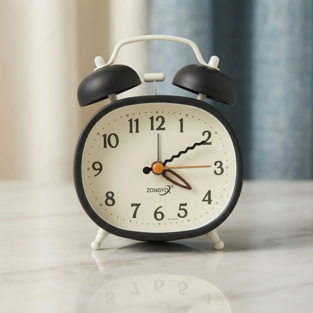 alarm clock black oval 5''x4'' china