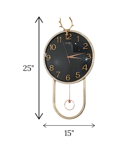 wall clock with golden deer & pendulum black china "25x15"
